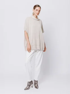 Maglia poncho collo alto