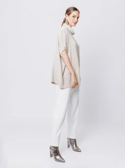 Maglia poncho collo alto