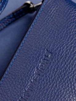 Tracolla in pelle con tre zip